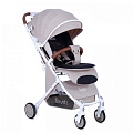 Детская прогулочная коляска Nuovita Giro Lux на белой раме (Beige, Bianco / Бежевый, Белый
						
					) — Фото